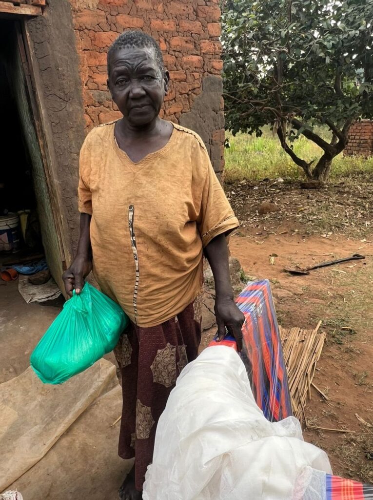 Mama Anna outside here residence