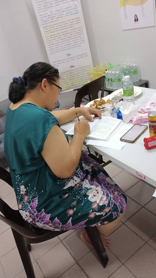 Ps. Saunah working on the translation